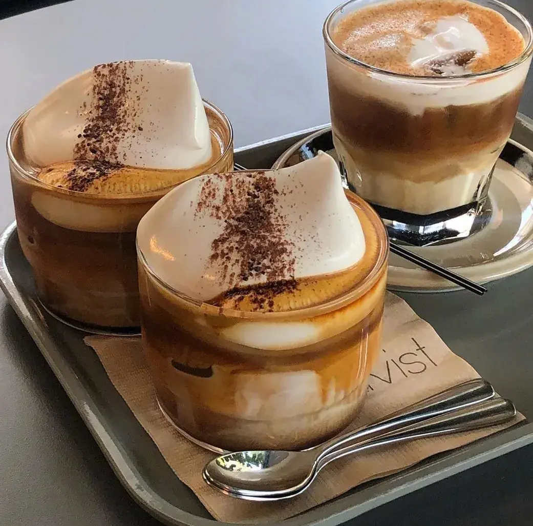 cup of coffee topped with whipped cream